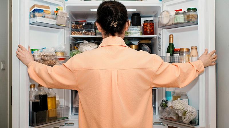 Standing-in-Front-of-Open-Refrigerator_800
